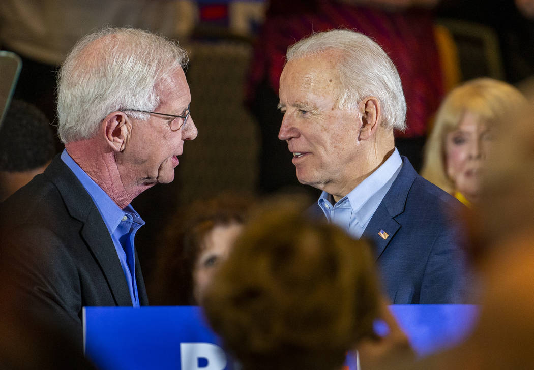 Capt. Chesley "Sully" Sullenberger, left, introduces former Vice President Joe Biden ...