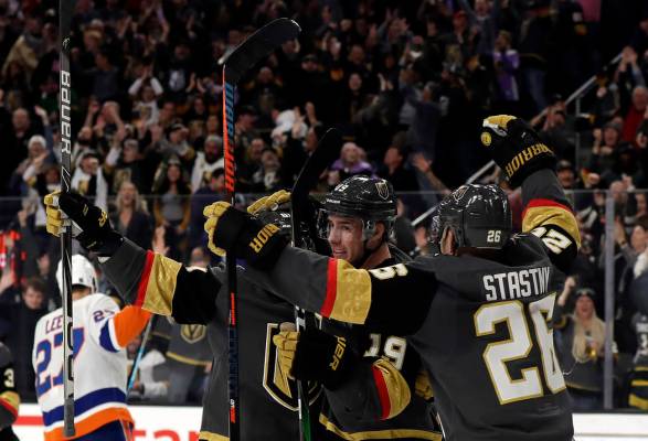 Vegas Golden Knights right wing Reilly Smith (19) celebrates after scoring against the New York ...