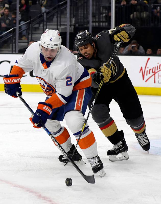 New York Islanders defenseman Nick Leddy (2) and Vegas Golden Knights right wing Ryan Reaves fi ...