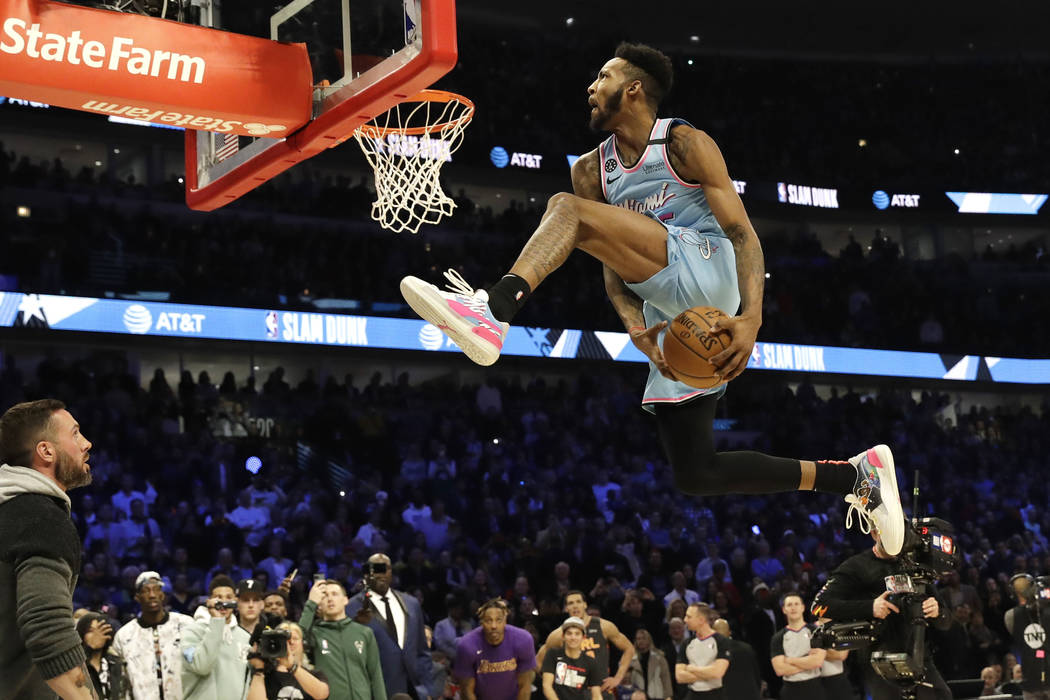 Miami Heat's Derrick Jones Jr. competes in the NBA All-Star slam dunk contest in Chicago, Satur ...