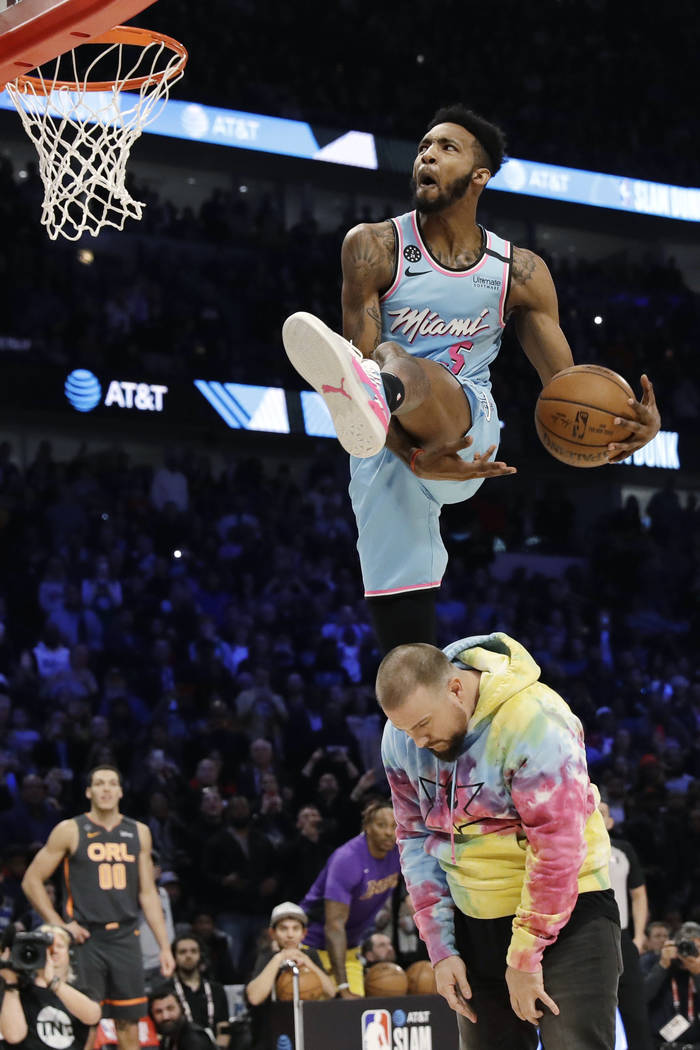 Miami Heat's Derrick Jones Jr. heads to the basket during the NBA All-Star slam dunk contest in ...