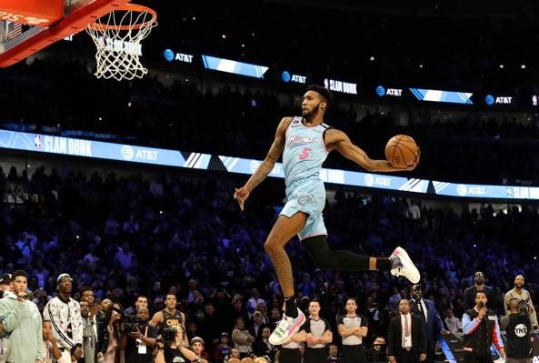 Miami Heat's Derrick Jones Jr. heads to the basket during the NBA All-Star slam dunk contest in ...