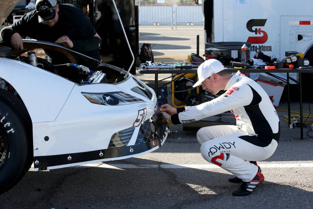 Las Vegas native and reigning NASCAR Cup Series champion Kyle Busch works on his car between pr ...