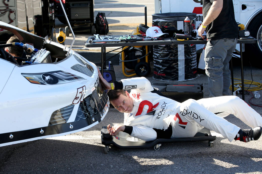 Las Vegas native and reigning NASCAR Cup Series champion Kyle Busch works on his car between pr ...