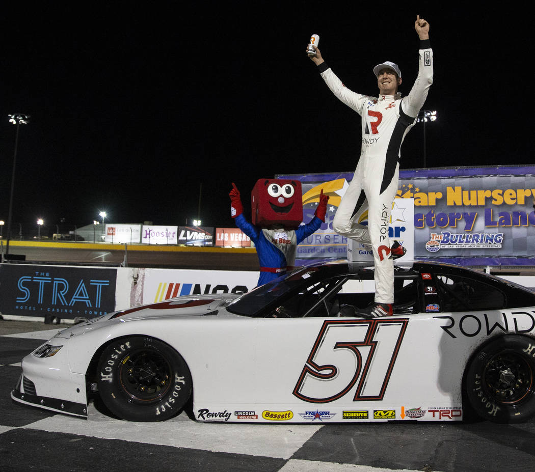 NASCAR star Kyle Busch celebrates after winning the Star Nursery 100 Super Late Model feature r ...