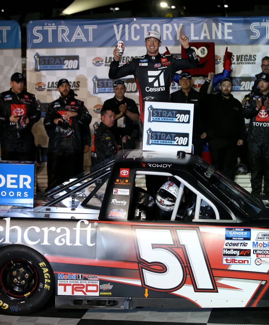 Kyle Busch celebrates winning the Strat 200 NASCAR Truck Series race at Las Vegas Motor Speedwa ...