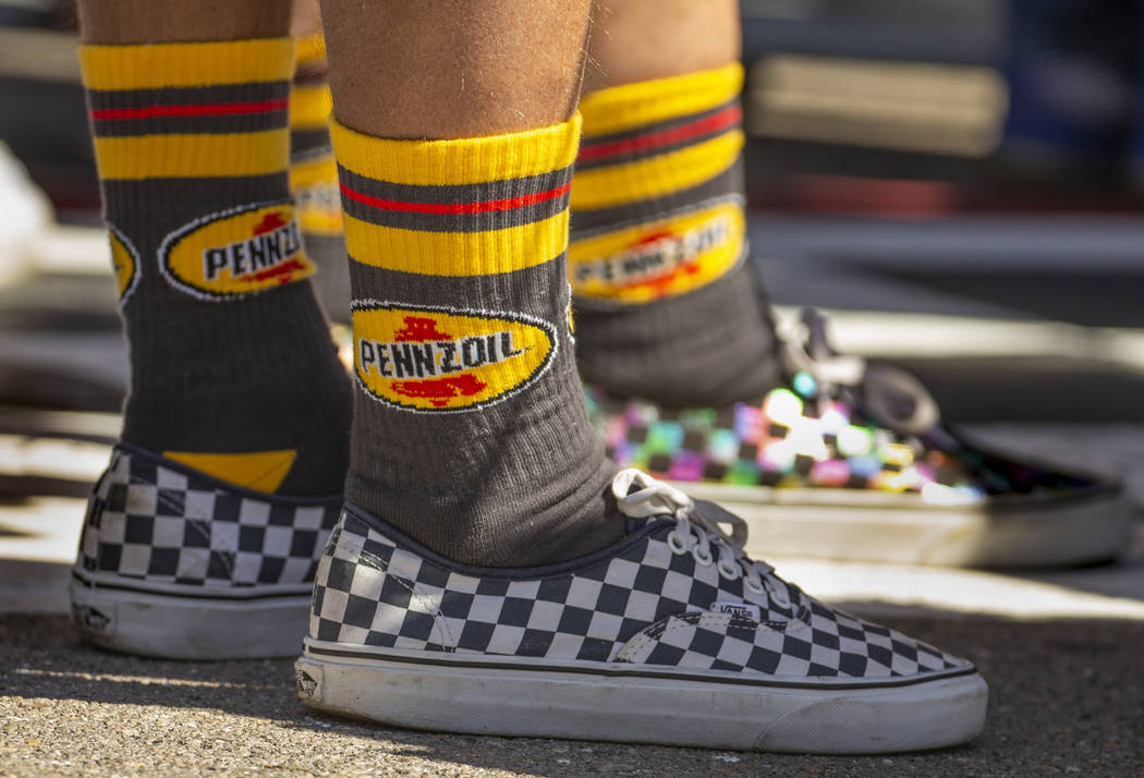Fans wear Pennzoil socks during the opening ceremonies for the Pennzoil 400 presented by Jiffy ...