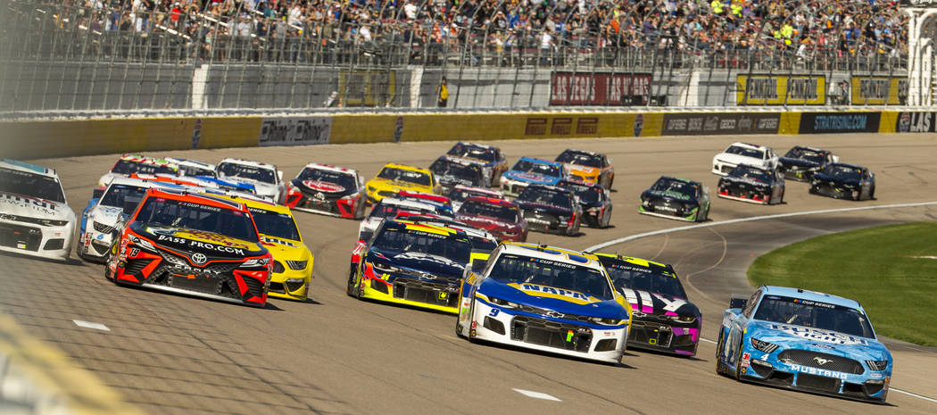 Cars pack up on another start during the Pennzoil 400 presented by Jiffy Lube, a NASCAR Cup Ser ...