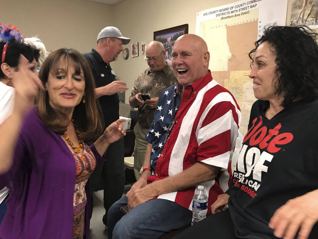 Nevada brothel owner Dennis Hof, second from right, celebrates with Heidi Fleiss, right, and ot ...