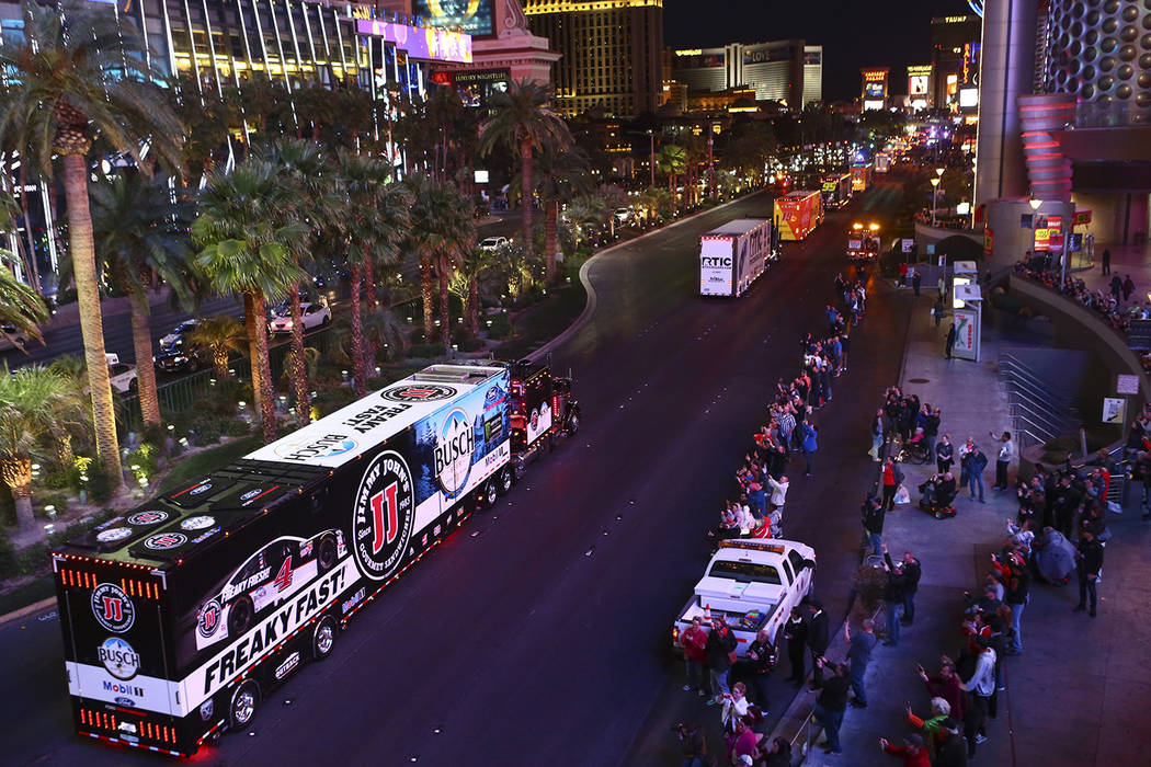 The hauler of Kevin Harvick (4) parades down the Las Vegas Strip near Harmon Road ahead of the ...