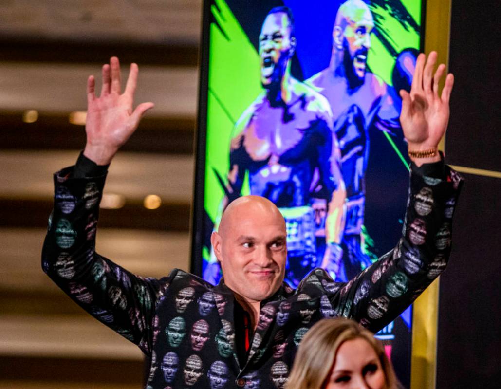 WBC heavyweight title fighter Tyson Fury greets his fans from the stage during the Grand Arriva ...