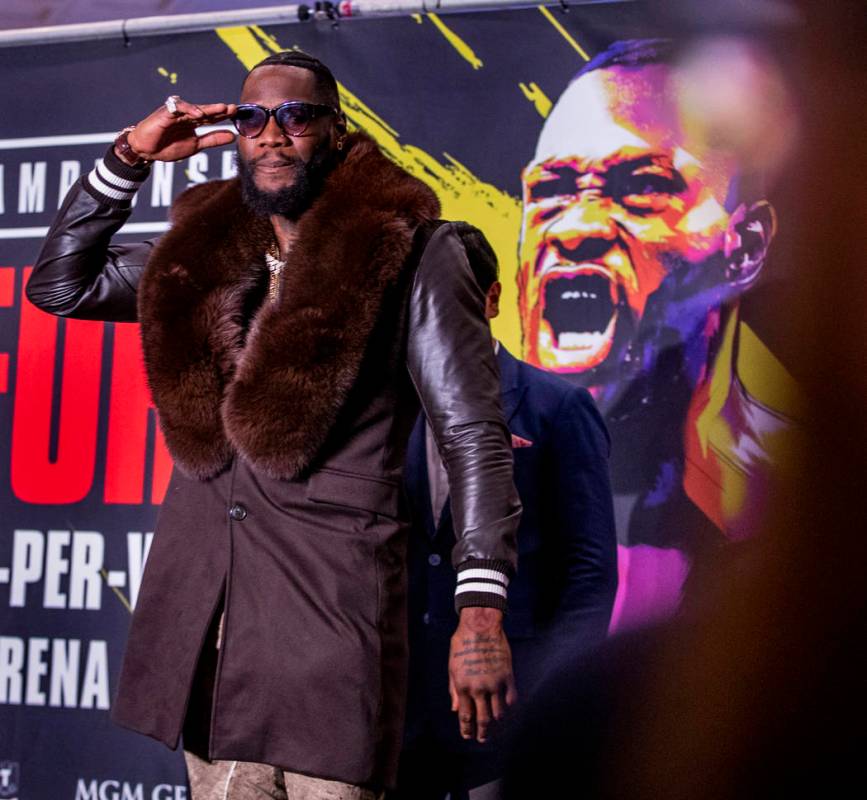 WBC heavyweight title fighter Deontay Wilder salutes the crowd on stage during the Grand Arriva ...