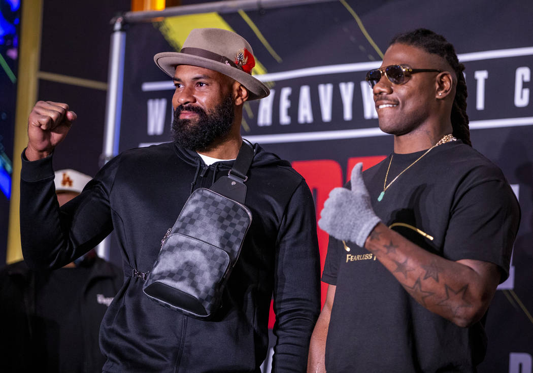 Heavyweight's Gerald Washington, left, and Charles Martin pose on the stage during the Grand Ar ...