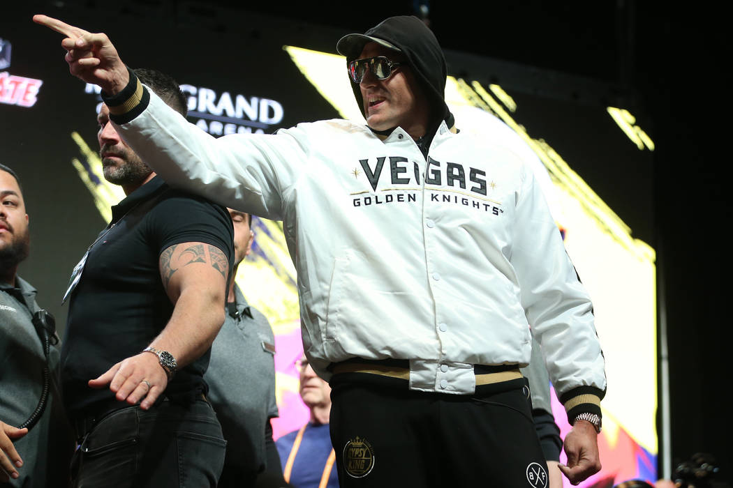 Tyson Fury gestures at Deontay Wilder, not pictured, during a press conference at the MGM Grand ...