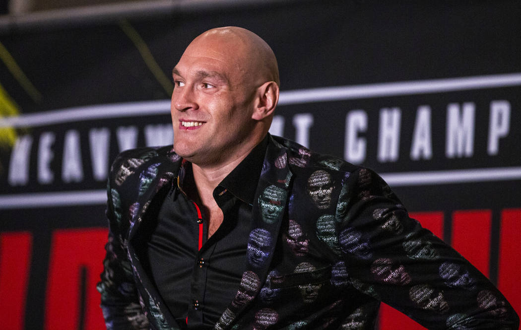 WBC heavyweight title fighter Tyson Fury looks out from the stage during the Grand Arrivals for ...