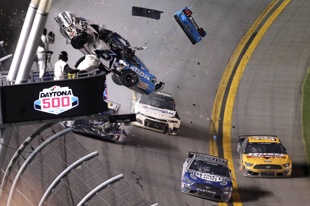 Ryan Newman (6) crashes on the last lap of the NASCAR Daytona 500 auto race at Daytona Internat ...