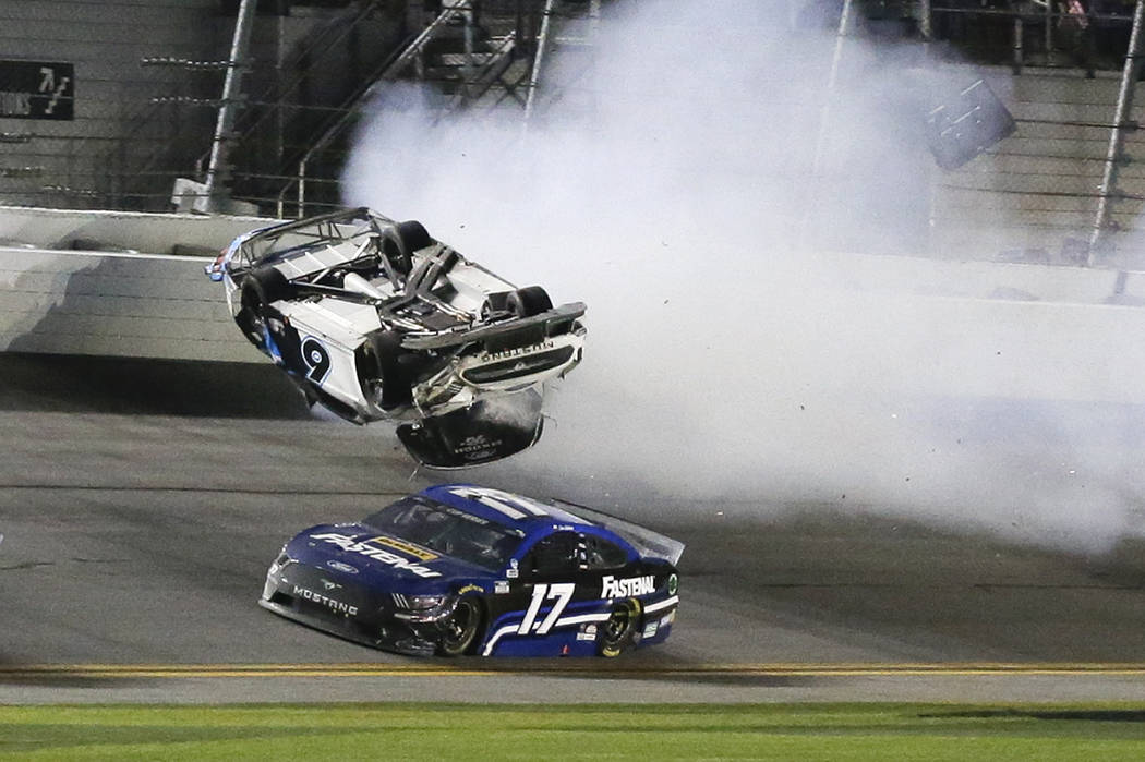 Chris Buescher (17) goes low to avoid Ryan Newman (6) a he wrecks and flips on the final lap of ...