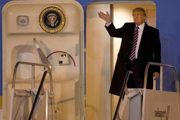 President Donald Trump arrives on Air Force One to McCarran International Airport on Tuesday, F ...