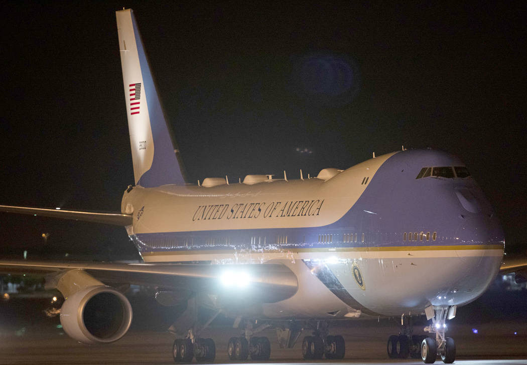 Air Force One arrives to McCarran International Airport on Tuesday, Feb. 18, 2020, in Las Vegas ...