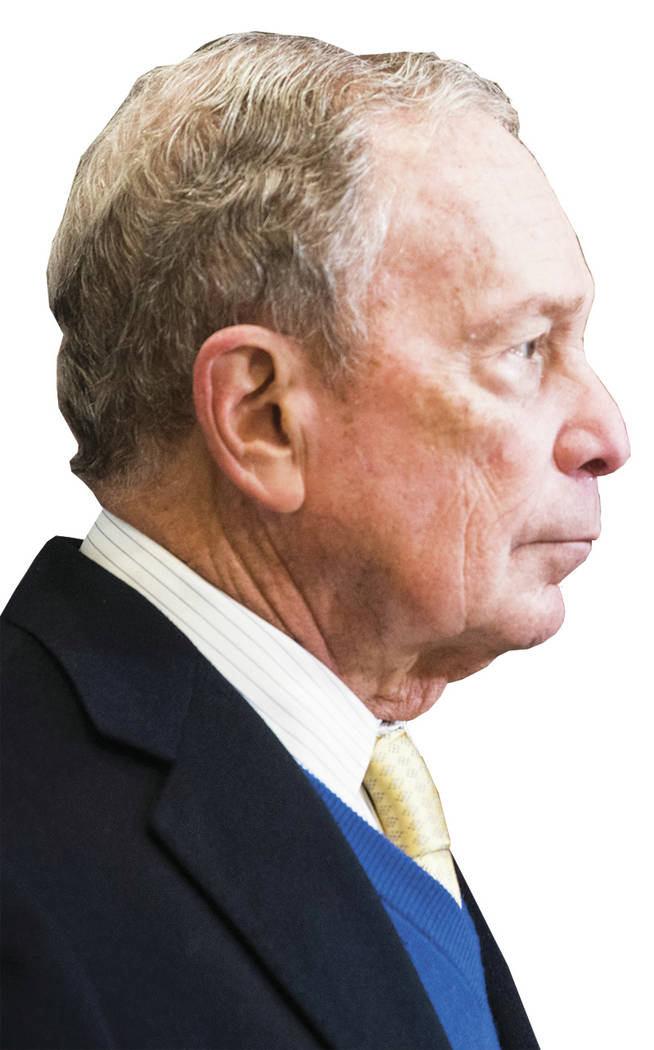 Democratic presidential candidate Mike Bloomberg talks with Alabama Democratic Conference chair ...
