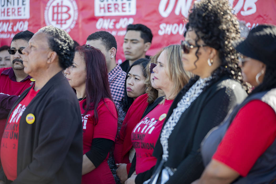 Members of the Culinary Workers Union, Local 226, listen as Geoconda ArgŸello-Kline, secr ...