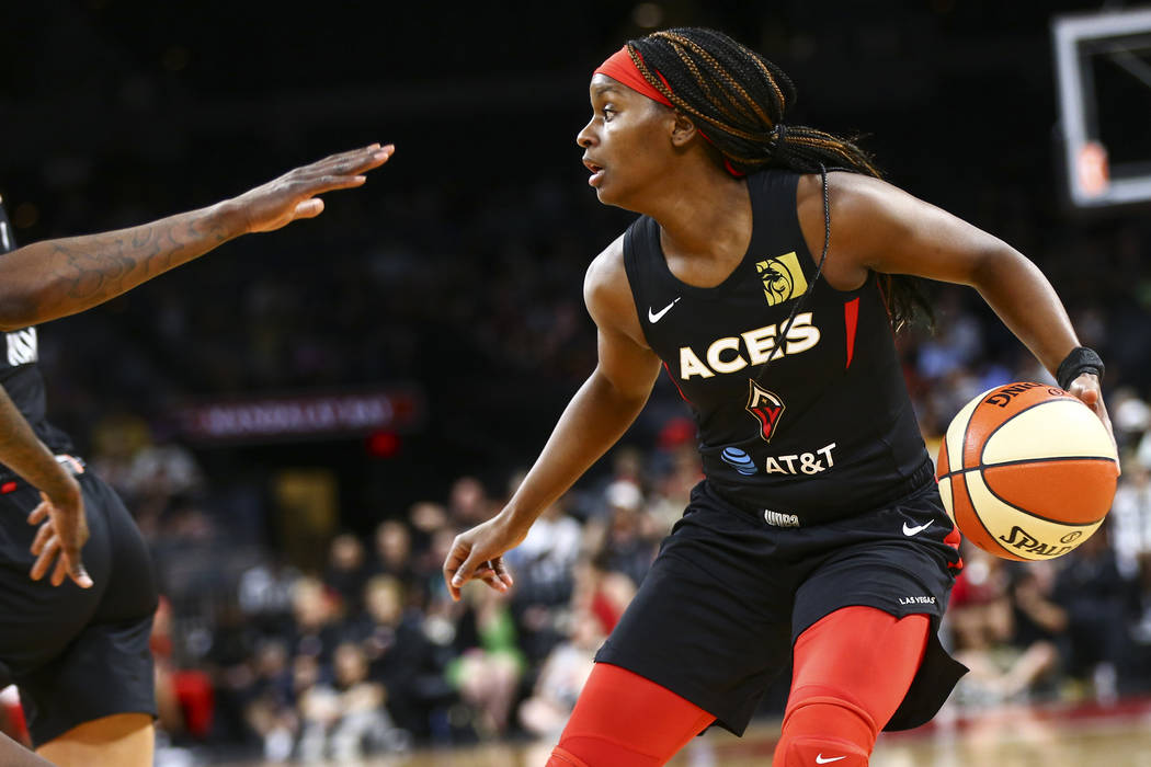 Las Vegas Aces guard Sugar Rodgers moves the ball against the Seattle Storm during the second h ...