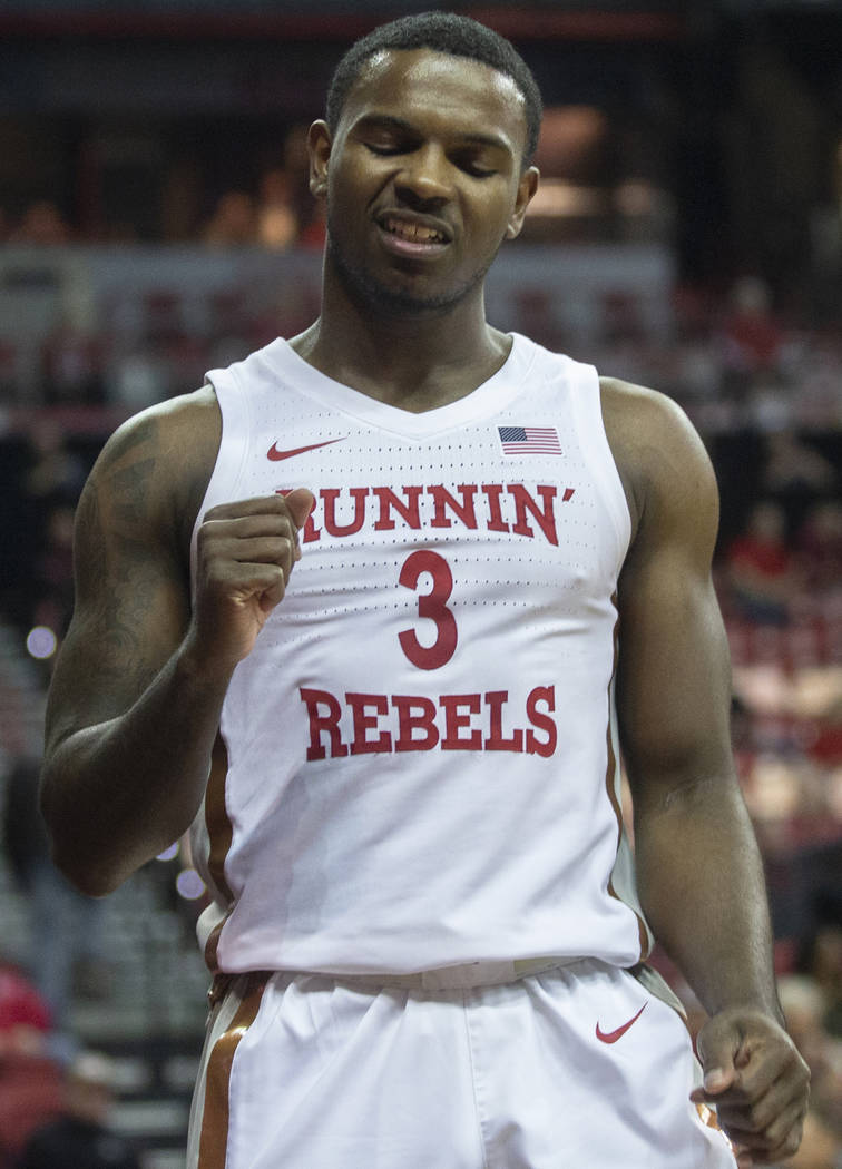 UNLV Rebels guard Amauri Hardy (3) celebrates after converting a fast break layup in the first ...