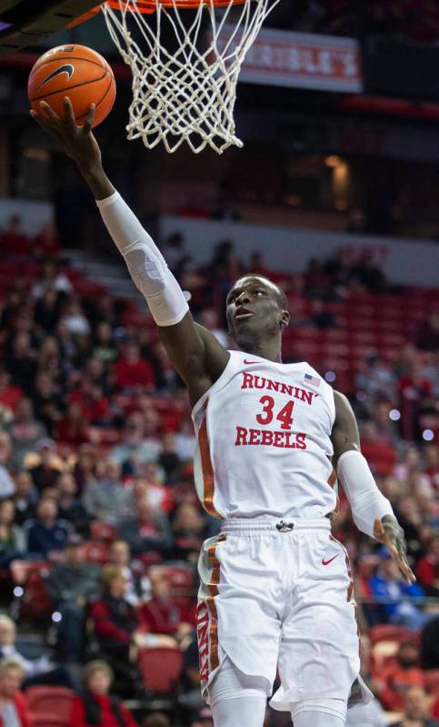 UNLV Rebels forward Cheikh Mbacke Diong (34) converts a fast break layup in the first half duri ...