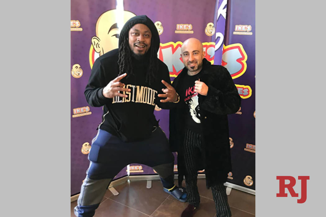 Marshawn Lynch poses with Ike Shehadeh of Ike's Love & Sandwiches. (Ike's Love & Sandwiches)