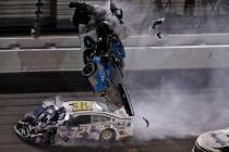 Ryan Newman (6) goes airborne after crashing into Corey LaJoie (32) during the NASCAR Daytona 5 ...