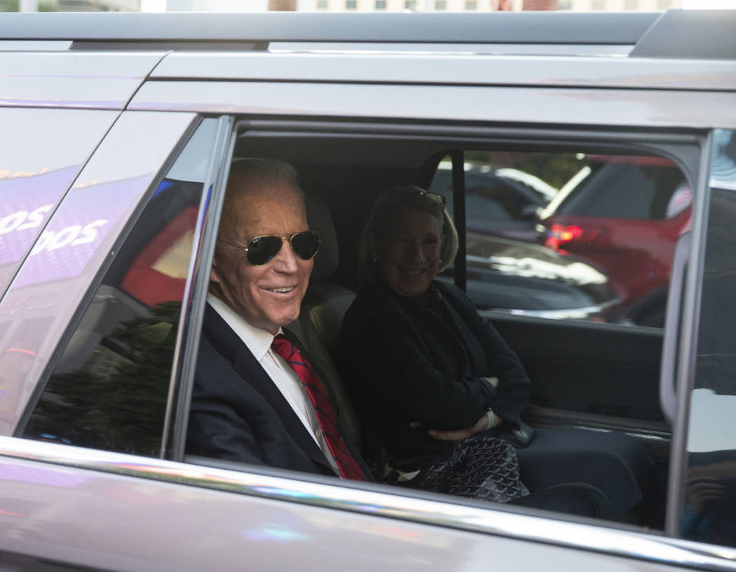 Democratic presidential candidate former Vice President Joe Biden, left, waits to pull into Par ...