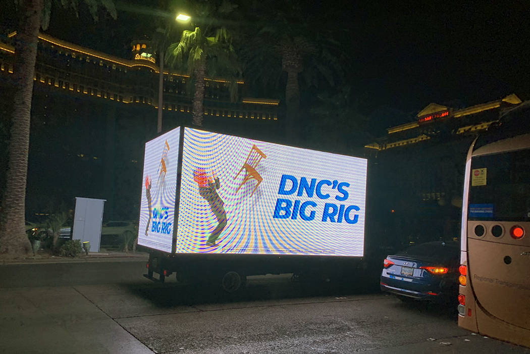 A mobile electronic billboard truck, hired by Republicans, drives down the Las Vegas Strip on W ...