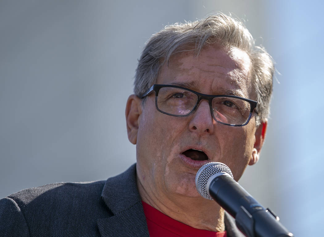 Ted Pappageorge, president of Culinary Union Local 226, fires up the crowd during a rally for w ...