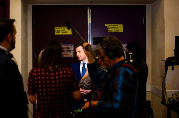 Democratic presidential candidate former South Bend Mayor Pete Buttigieg walks into the media s ...