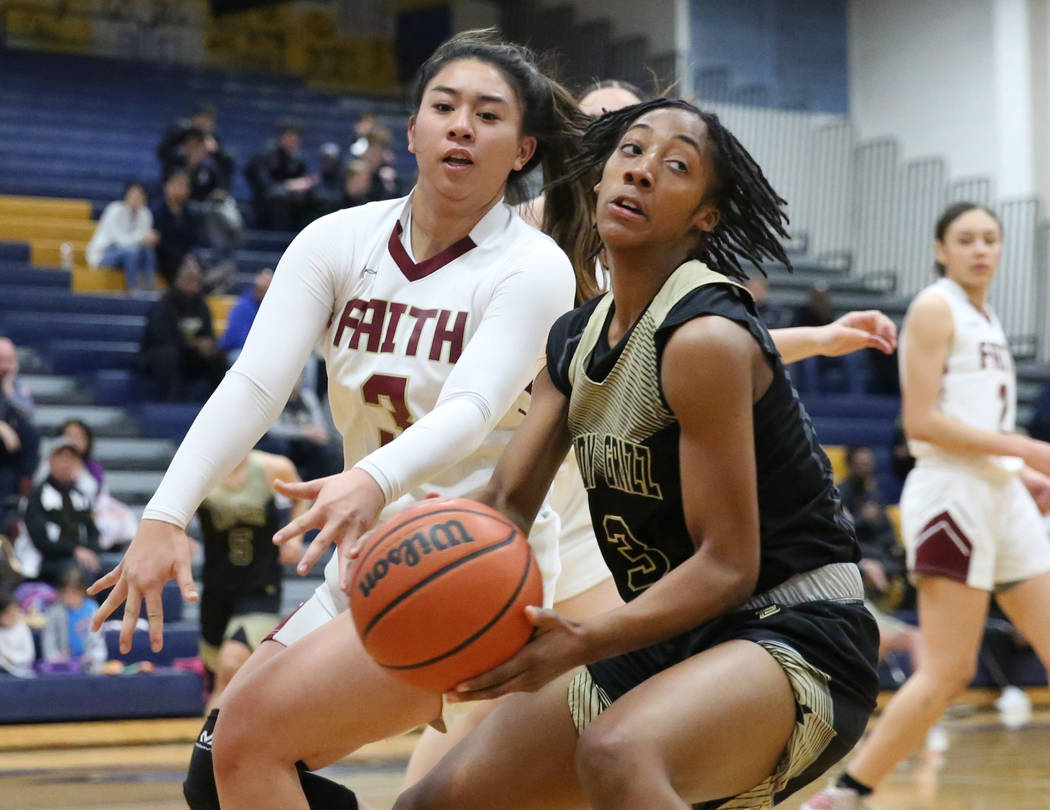 Faith Lutheran's Jalen Tanuvasa, left, defends Spring Valley's Aaliyah Gayles (3) during the se ...