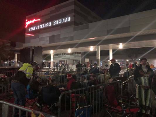 A crowd camps outside the Las Vegas Convention Center on Thursday, Feb. 20, 2020, where Preside ...