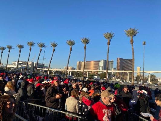 A long line of people wait Friday, Feb. 21, 2020, to gain entrance to the Las Vegas Convention ...