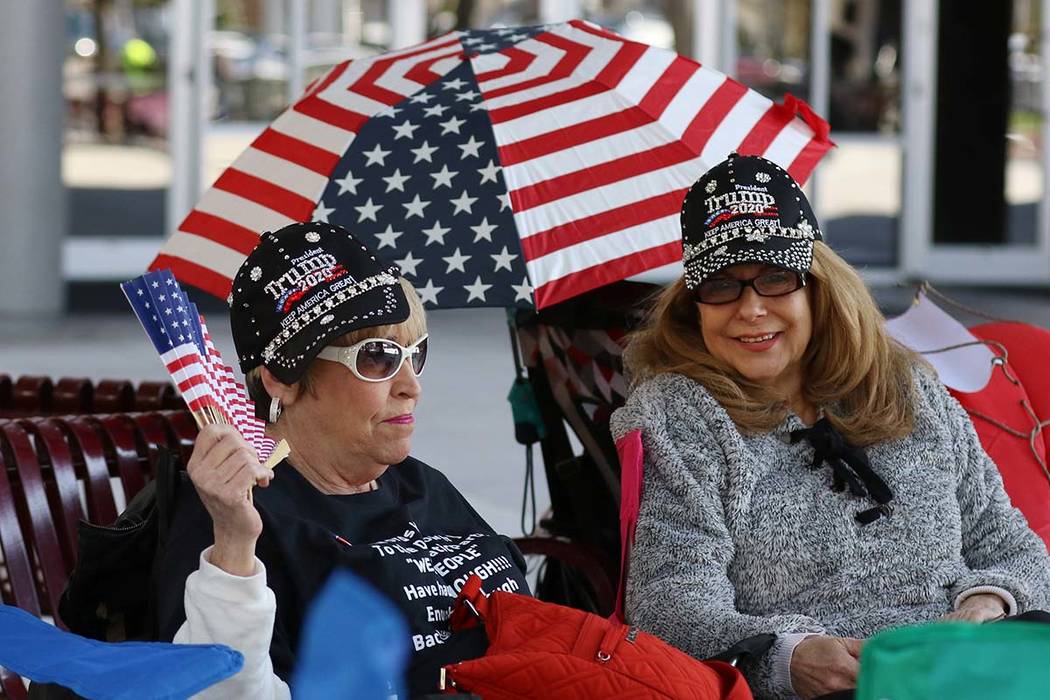 Lynn Caplan, left, and Nancy Curtin, both of Las Vegas, camp outside the Las Vegas Convention C ...