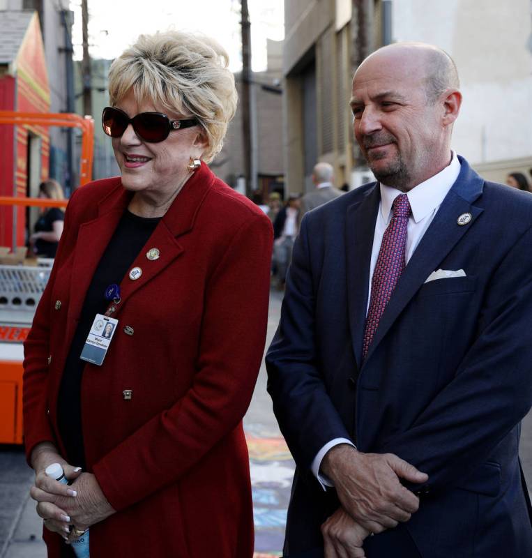 Mayor Carolyn Goodman, left, and developer Todd Kessler watch Jules Kessler play a donated pian ...