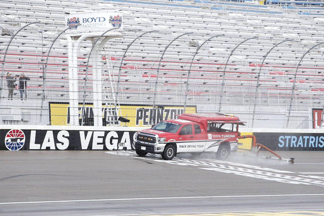 A jet dryer attempts to dry the track after a rain delay before the start of NASCAR Xfinity Ser ...