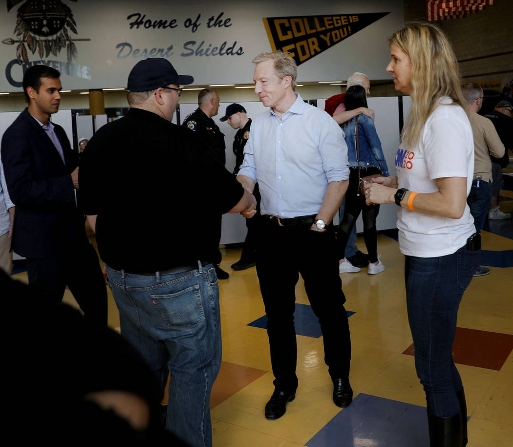 Tom Steyer greets caucus participants at Cheyenne High School in North Las Vegas on Saturday, F ...