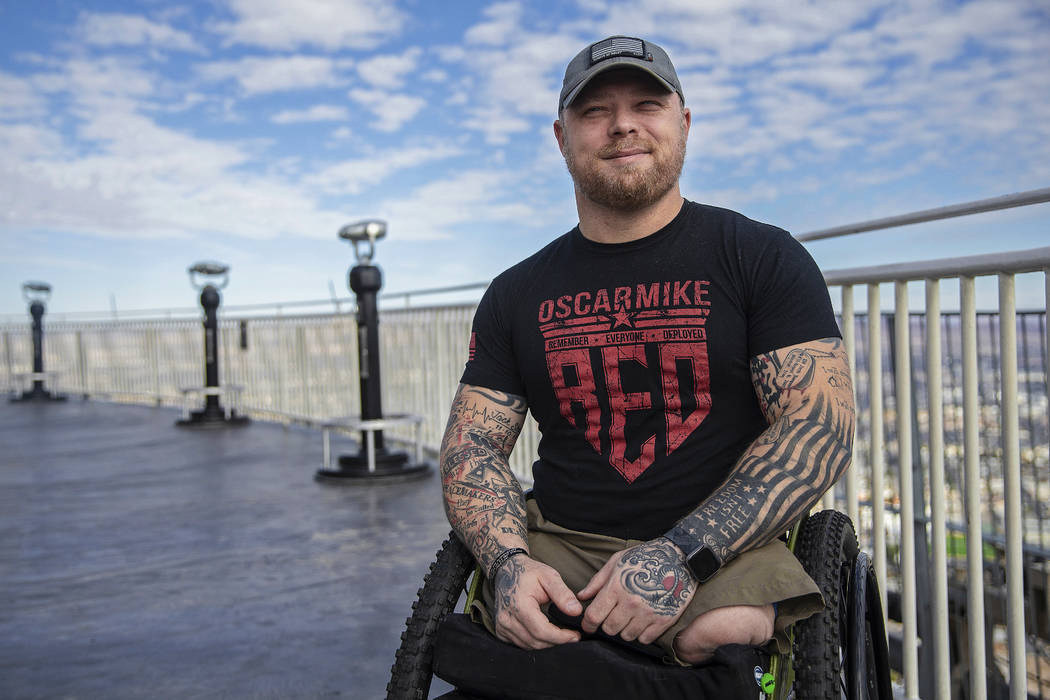 Travis Strong, an Army veteran who lost both legs during an attack in Baghdad, climbed 108 floo ...