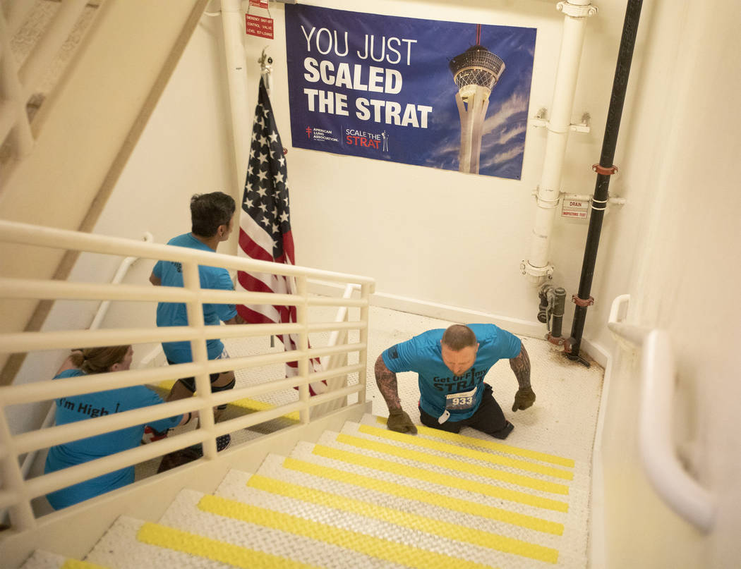 Travis Strong begins to climb the 108th level of stairs at the Strat on Sunday, Feb. 23, 2020, ...