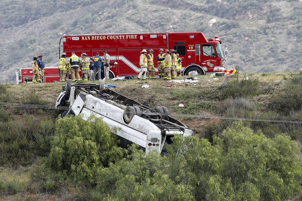 A bus rolled down an embankment off Interstate 15 in North San Diego County Saturday, Feb. 22, ...