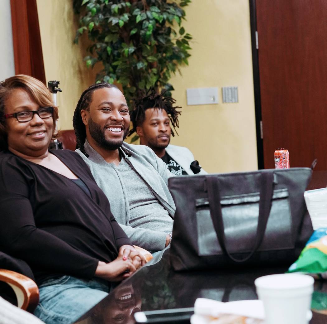 Rhonda Nolan, Kelvin Bell and Marcus Miller plan the final round of Native Son Spelling Bee. (P ...