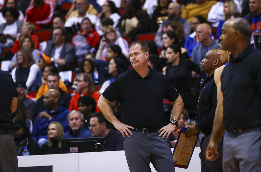 Bishop Gorman head coach Grant Rice watches as his team plays Coronado during the first half of ...