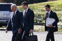 White House Chief of Staff John Kelly, left, walks with White House staff secretary Rob Porter, ...