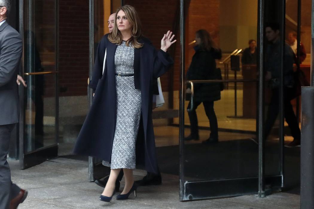 Michelle Janavs leaves federal court, Tuesday, Feb. 25, 2020, in Boston, after being sentenced ...