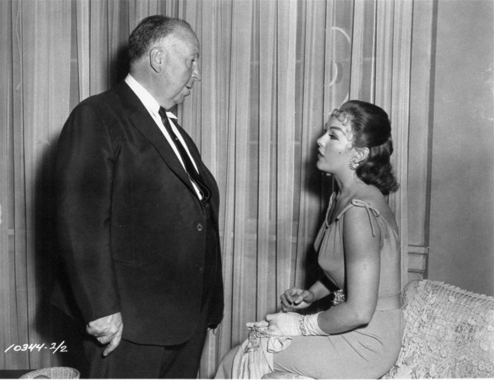 Director Alfred Hitchcock has a word with actress Kim Novak in this undated file photo on the s ...