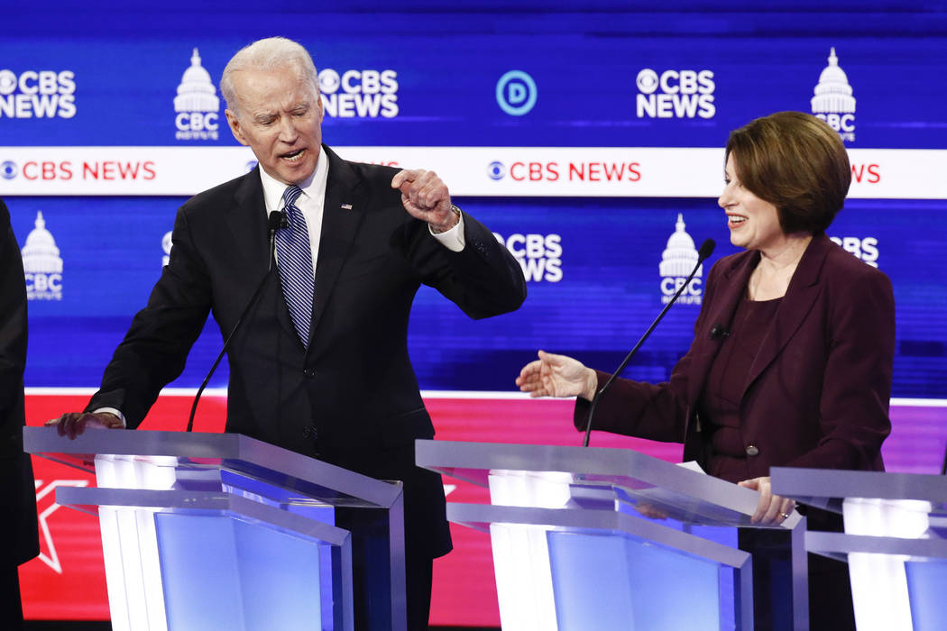 Democratic presidential candidates, former Vice President Joe Biden, left, and Sen. Amy Klobuch ...